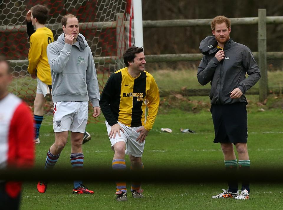 Prince William and Prince Harry play in the annual Sandringham Football Match, December 2015.