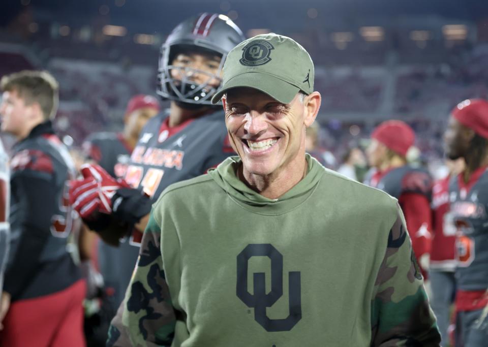 Oklahoma head coach Brent Venables celebrates with the team following a college football game between the University of Oklahoma Sooners and the West Virginia Mountaineers at Gaylord Family-Oklahoma Memorial Stadium in Norman, Okla., Saturday, Nov., 11, 2023.