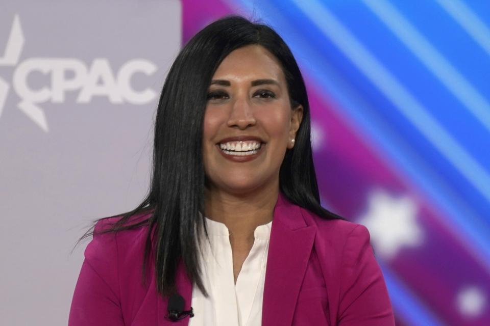 FILE - Cassy Garcia, Republican candidate for Congress in Texas' 28th Congressional District, smiles on stage at the Conservative Political Action Conference (CPAC) in Dallas, Aug. 5, 2022. (AP Photo/LM Otero, File)
