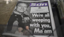 A newspaper with a front page photo of Britain's Prince Philip at a newsstand in London, Saturday, April 10, 2021. Britain's Prince Philip, the irascible and tough-minded husband of Queen Elizabeth II who spent more than seven decades supporting his wife in a role that mostly defined his life, died on Friday. (AP Photo/Alberto Pezzali)