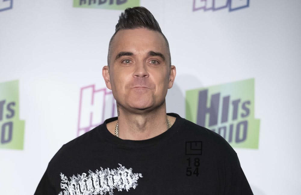 Robbie Williams has secretly dropped new music credit:Bang Showbiz