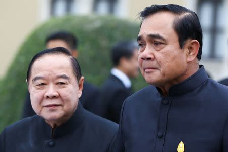 Thailand's Prime Minister Prayuth Chan-ocha (R) and Deputy Prime Minister and Defence Minister Prawit Wongsuwan look on before a weekly cabinet meeting at Government House in Bangkok, Thailand, January 4, 2017. REUTERS/Athit Perawongmetha