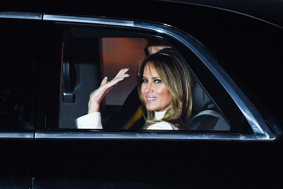 US First Lady Melania Trump waves sitting next to President Donald as they leave Palam Air Force Base in New Delhi on February 24, 2020. (Photo by Prakash SINGH / AFP) (Photo by PRAKASH SINGH/AFP via Getty Images)