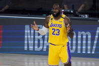 Los Angeles Lakers' LeBron James (23) reacts after a play against the Toronto Raptors during the first half of an NBA basketball game Saturday, Aug. 1, 2020, in Lake Buena Vista, Fla. (AP Photo/Ashley Landis, Pool)