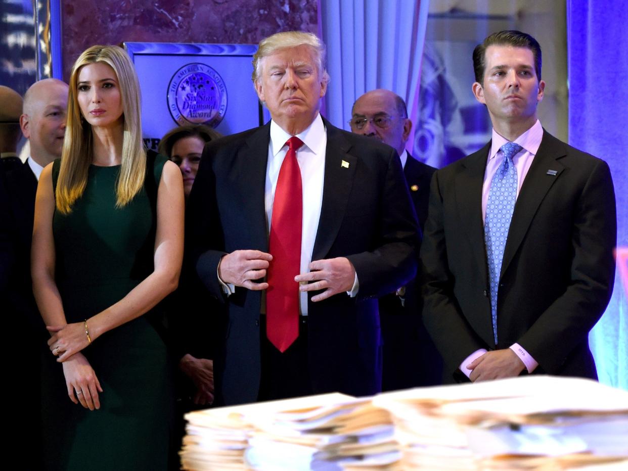 Donald Trump with Ivanka Trump and Donald Trump Jr in New York in 2017: Timothy A. Clary/AFP/Getty Images