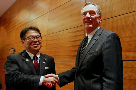 U.S. Trade Representative Robert Lighthizer (R) and Japan's Trade Minister Hiroshige Seko pose for a photo during the APEC Ministers Responsible For Trade (APEC MRT 23) meeting in Hanoi, Vietnam May 20, 2017. REUTERS/Kham