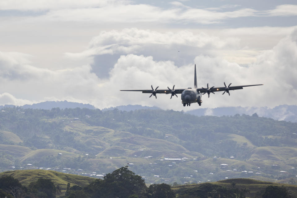 In this handout provided by the Australian Department of Defence, A Royal Australian Air Force C-130 Hercules aircraft, prepares to land at Honiara International Airport on November 30, 2021 in Honiara, Guadalcanal Island, Solomon Islands. 