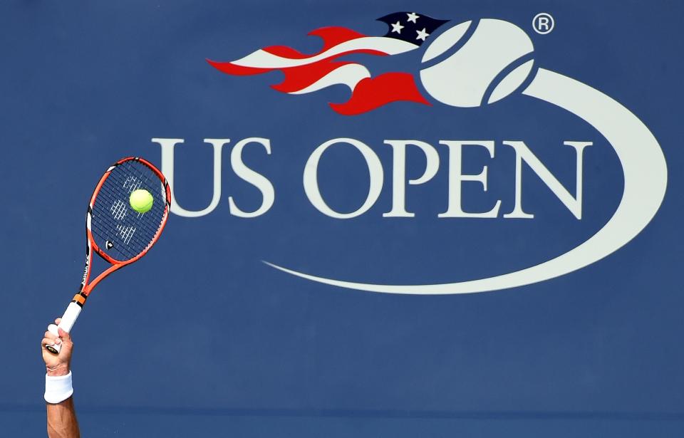 Stan Wawrinka of Switzerland returns to Hyeon Chung of South Korea during their 2015 US Open men's singles round 2 match at USTA Billie Jean King National Tennis Center in New York on September 3, 2015. AFP PHOTO/JEWEL SAMAD    (Photo credit should read JEWEL SAMAD/AFP via Getty Images)