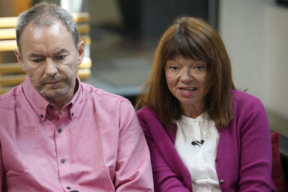 Simon Glass, left, and his wife, Sally Glass, talk about the $19 million settlement from state and local law enforcement agencies for the killing of the couple's 22-year-old son, Christian, in June 2022, while he suffered a mental health crisis on Tuesday, May 23, 2023, during a news interview in the offices of the couple's lawyers in Denver. As part of the settlement, training for law officers will change as well. (AP Photo/David Zalubowski)