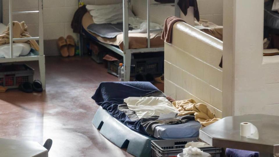 A cot-style sleeping arrangement referred to as a boat is set up on the floor of a dorm on a day when this area of the jail was over capacity.