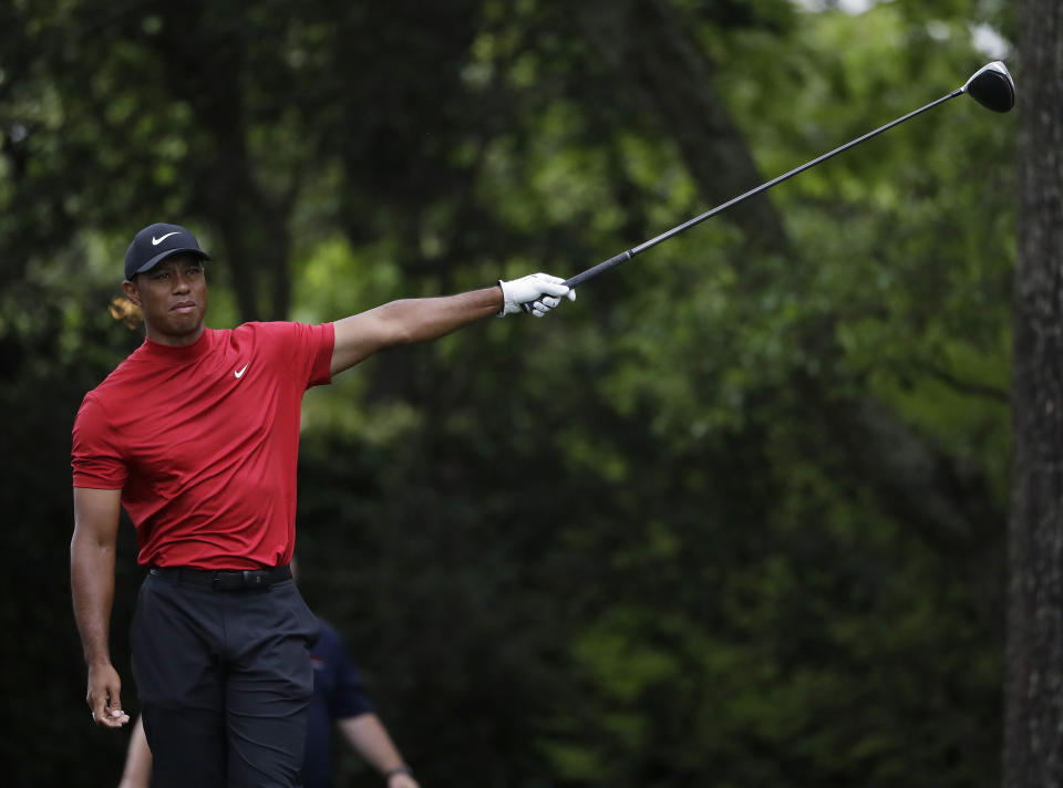 Tiger Woods reacts to his drive on the second hole during the final round for the Masters golf tournament Sunday, April 14, 2019, in Augusta, Ga. (AP Photo/Marcio Jose Sanchez)