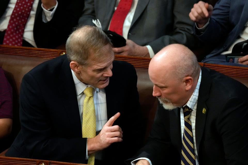 Rep.-elect Jim Jordan (R-OH) (L) and Rep.-elect Chip Roy (R-TX) confer before the House of Representatives reconvenes on Wednesday, Jan. 4, 2023, trying to elect a Speaker of the House as the 118th session of Congress begins.