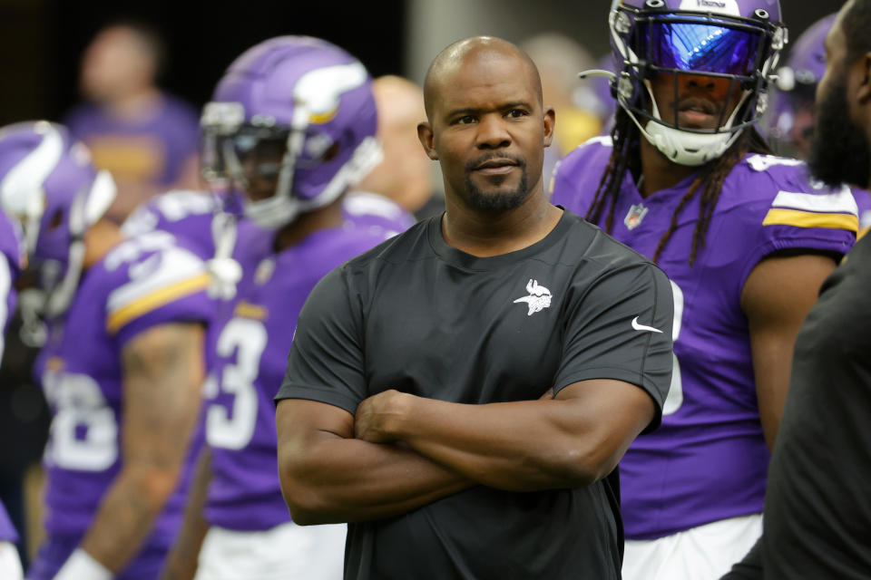 FILE - Minnesota Vikings defensive coordinator Brian Flores watches his players prior to an NFL preseason football game against the Arizona Cardinals, Saturday, Aug. 26, 2023, in Minneapolis. Flores has exceeded even head coach Kevin O'Connell's expectations for what he could accomplish in his first season as defensive coordinator of the Minnesota Vikings. (AP Photo/Bruce Kluckhohn, File)