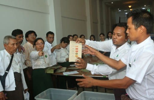 Election Commission officials count ballots at a polling station in Yangon during parliamentary by-elections on April 1. Laws that have stifled free speech are starting to loosen in Myanmar, amid widespread reforms by a new regime