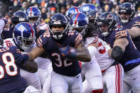 Chicago Bears running back David Montgomery heads to the end zone for a touchdown during the first half of an NFL football game against the New York Giants Sunday, Jan. 2, 2022, in Chicago. (AP Photo/David Banks)