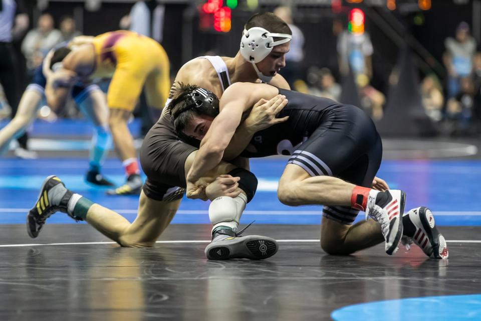 Dean Peterson of Rutgers wrestles Luke Stanich of Lehigh during the Men’s Division I NCAA Wrestling Championships at T-Mobile Center.