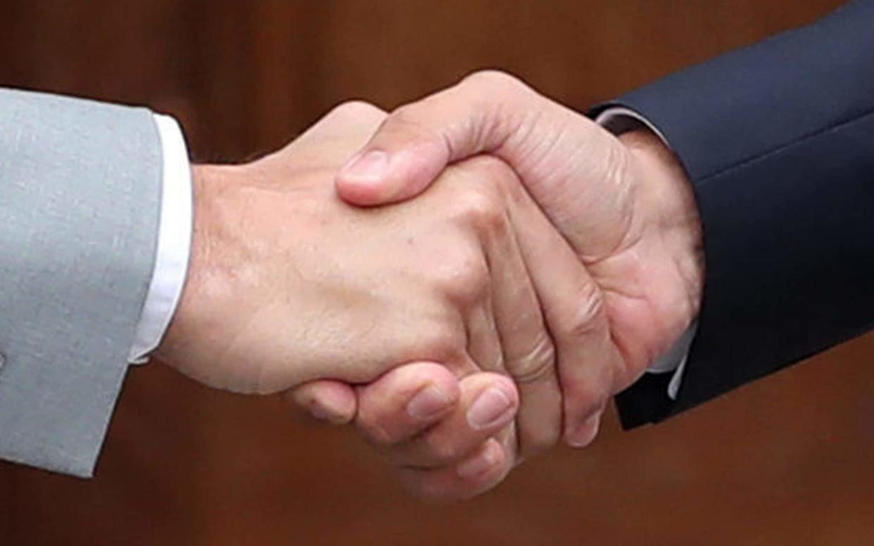 A new study has linked a strong handshake to a healthy heart  - PA