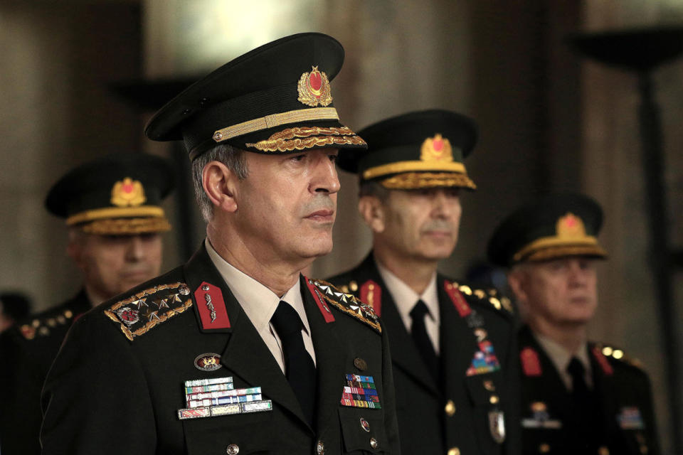 <p>Chief of general staff General Hulusi Akar stands with other Military chiefs during a Supreme Military Council meeting with the Prime Minister Binali Yildirim at Ataturk’s mausoleum in Ankara on July 28, 2016. (Photo: Ali Unal/AP)</p>