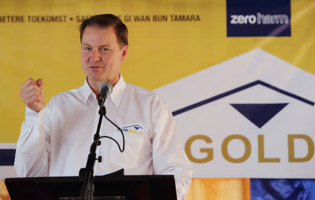 Gary Goldberg, CEO of Newmont Mining Corporation, speaks during the ceremonial groundbreaking of the Merian Gold Project in Sipaliwini district December 10, 2014. The Merian project, operated by Surgold, which is owned by Newmont and Staatsolie, contains estimated gold reserves of 4.2 million ounces and is expected to increase Newmont's global production of gold by 7 percent, according to the company's press release. REUTERS/Ranu Abhelakh (SURINAME - Tags: BUSINESS COMMODITIES)