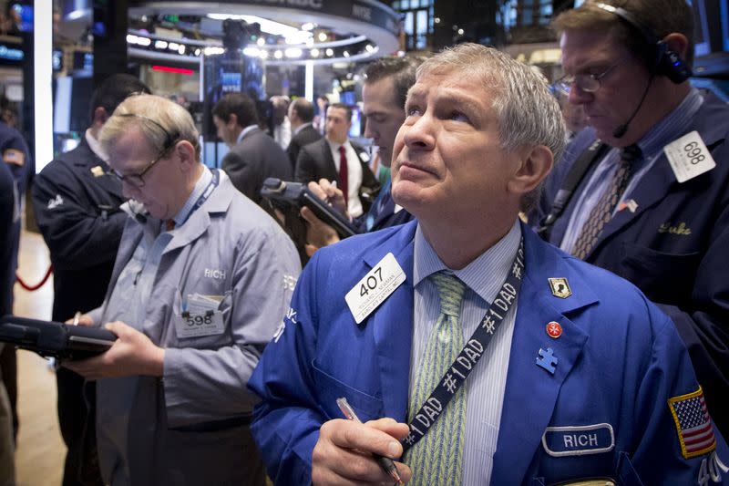 Traders work on the floor of the New York Stock Exchange May 6, 2015. REUTERS/Brendan McDermid