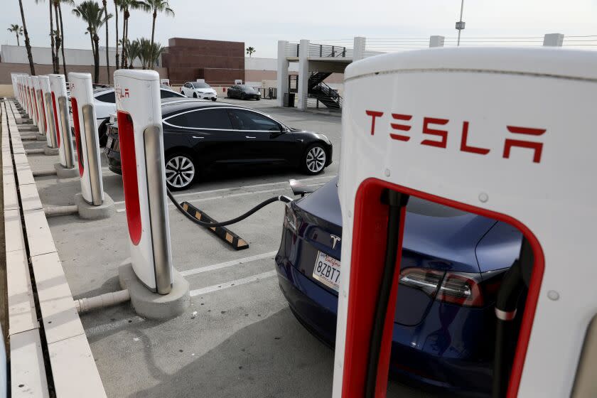 BURBANK, CA - FEBRUARY 16: Tesla Supercharger at the Burbank Town Center Thursday, Feb. 16, 2023 in Burbank, CA. Tesla, Inc. is recalling 362,758 vehicles in the U.S. because its Full Self-Driving Beta software may cause a crash, according a notice from the National Highway Transportation Safety Administration. (Gary Coronado / Los Angeles Times)