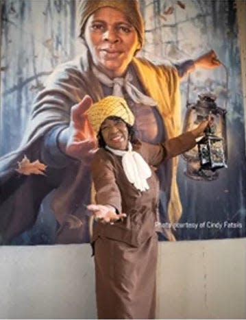 Shirley Lee Corsey portrays Harriet Ross Tubman in the "Journey Through Time: The Underground Railroad Unveiled" performance at Gather Place," as part of its Black History Month 2024 programming.