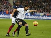 Football Soccer - France v Germany - International Friendly match - Stade de France, 13/11/15. France's Paul Pogba in action with Germany's Sami khedira. REUTERS/Benoit Tessier