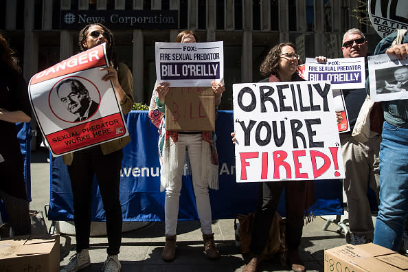 APRIL 18: Demonstrators rally against Fox News television personality Bill O’Reilly outside of the News Corp. and Fox News headquarters in Midtown Manhattan in New York City. (Drew Angerer/Getty Images)