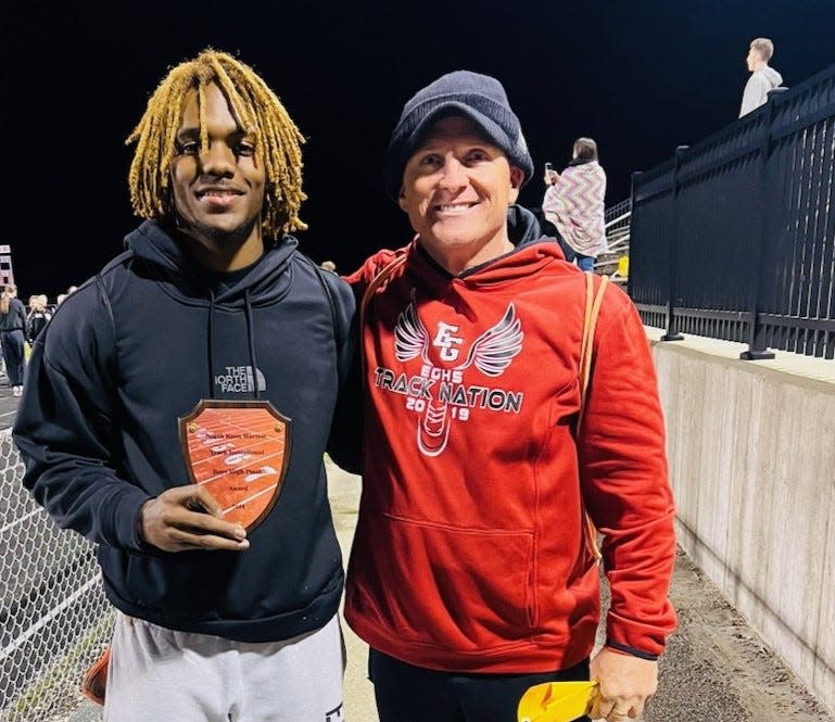 Eastern Greene's James Lewis (left) with coach Bill Valentine, was named the High Point Man of the Meet at the North Knox Invitational on Friday, April 12, 2024.