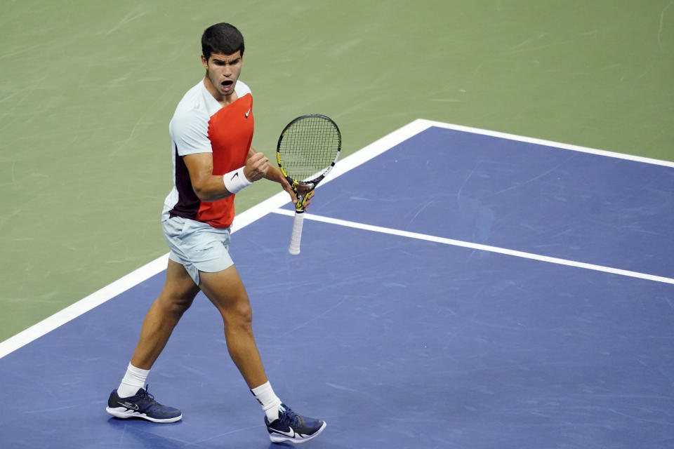 Carlos Alcaraz, of Spain, celebrates a point against Frances Tiafoe, of the United States, during the semifinals of the U.S. Open tennis championships, Friday, Sept. 9, 2022, in New York. (AP Photo/Mary Altaffer)