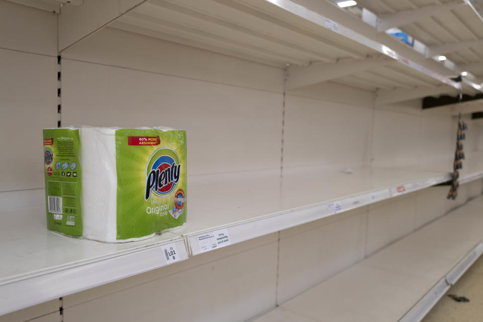 Supermarkets struggle with toilet roll shortages as people are confined to their houses by covid.