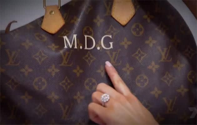 Is… is that Times New Roman? *shakes head* why not just get your bags monogrammed with Comic Sans and be done with it? Source: Channel Seven