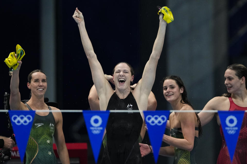 Cate Campbell, of Australia, and teammates celebrate after winning the gold medal in the women's 4x100-meter medley relay final at the 2020 Summer Olympics, Sunday, Aug. 1, 2021, in Tokyo, Japan. (AP Photo/Gregory Bull)