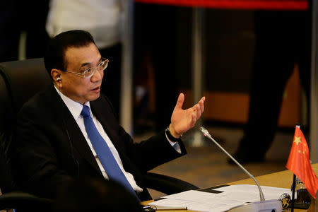 Chinese Premier Li Keqiang gestures during the 20th ASEAN China Summit in Manila, Philippines, November 13, 2017. REUTERS/Linus Escandor II/Pool