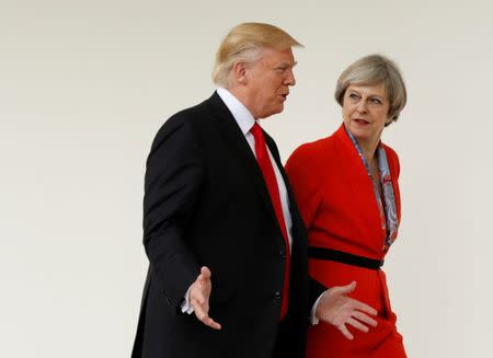 U.S. President Donald Trump escorts British Prime Minister Theresa May after their meeting at the White House in Washington, U.S., January 27, 2017. REUTERS/Kevin Lamarque