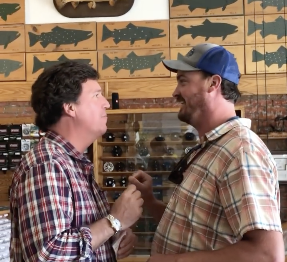 A man posted a video of himself telling Tucker Carlson that he was ‘the worst person alive’ in a fishing goods store in Montana (Dan Bailey)