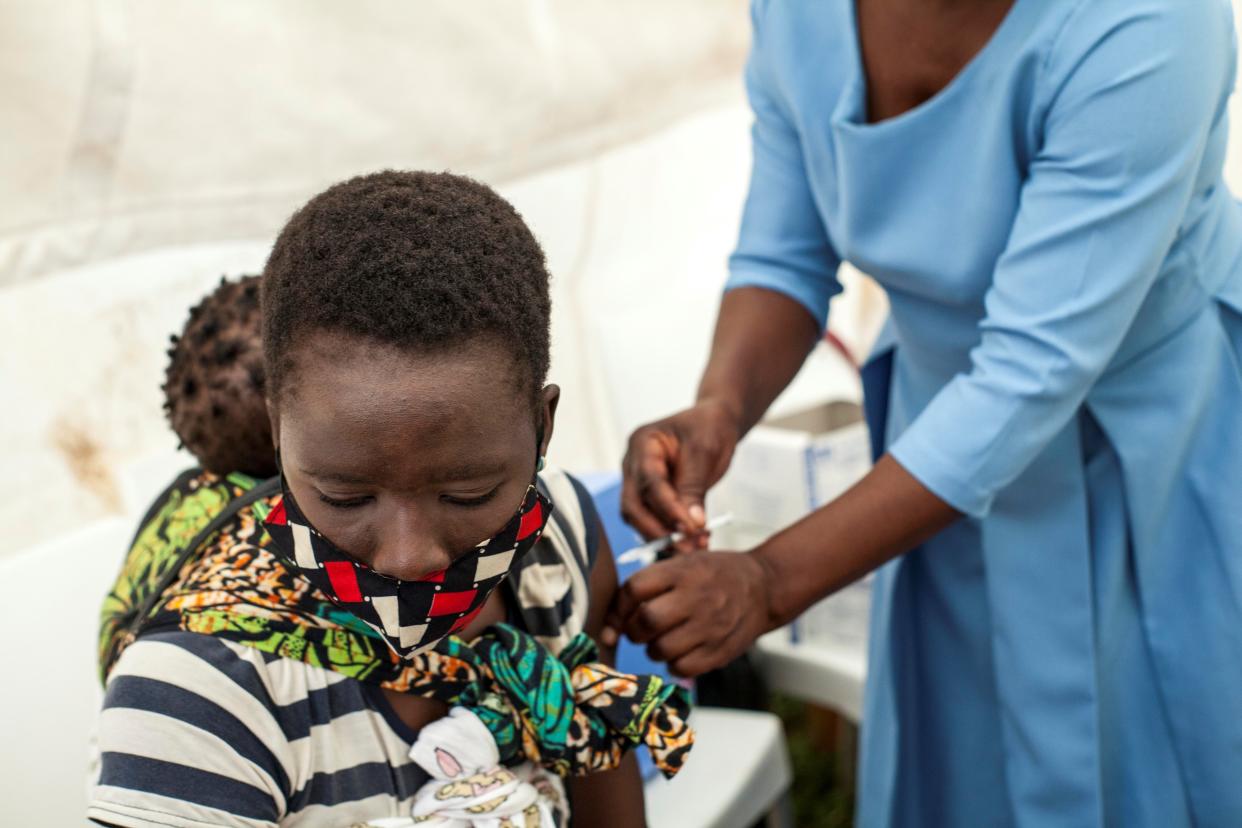 BLANTYRE, March 26, 2021 -- A woman receives the COVID-19 vaccine at a clinic in Blantyre, Malawi, on March. 26, 2021. In the first phase, the Malawi government identified priority groups to be the first to receive the COVID-19 vaccine, including all health workers and people with high risks of contracting the virus. Blantyre District Office alone has registered about 12,000 recipients of vaccine against COVID-19 during the first phase of the campaign. (Photo by Joseph Mizere/Xinhua via Getty) (Xinhua/Joseph Mizere via Getty Images)