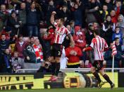 Sunderland's Phil Bardsley (L) celebrates scoring against Manchester City during their English Premier League soccer match at The Stadium of Light in Sunderland, northern England, November 10, 2013.