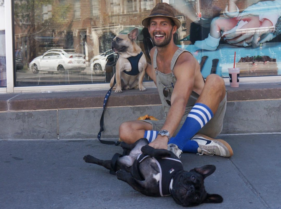 Ryan Fischer with Lady Gaga's Frenchies,  Asia and Koji. (Screenshot: valleyofthedogs via Instagram)