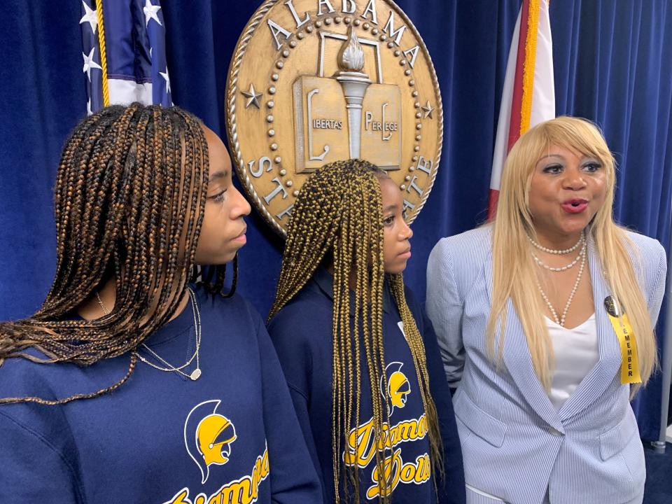 Brooke Bennett, Breanna Bennett and Rep. Rolanda Hollis, D-Birmingham, discuss passage of Hollis’ bill creating a grant program to put free  feminine hygiene products in Title I schools on April 5, 2022.  The Bennetts, 14-year-old twins, founded Women In Training (W.I.T.) in 2019 to provide feminine hygiene products to those who can't afford them.