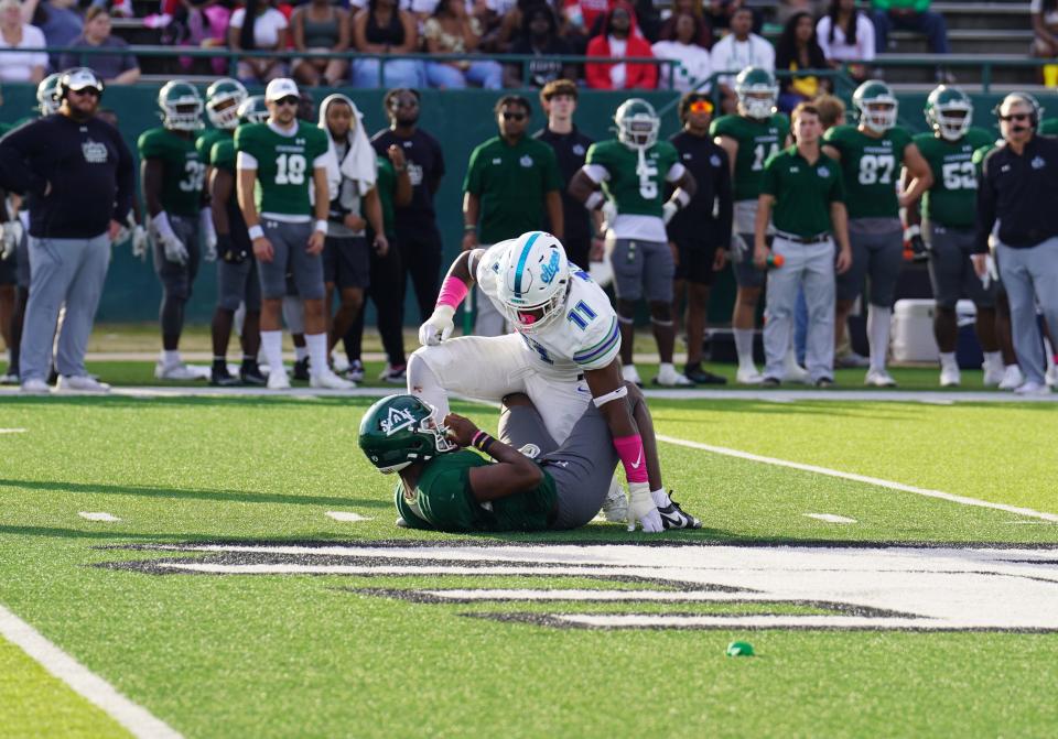 West Florida's Byron Puryear gets to this feet after hitting Delta State quarterback Patrick Shegog during the Argos' 24-21 win on Saturday, Oct. 21, 2023 from Parker Field at McCool Stadium in Cleveland, Mississippi.