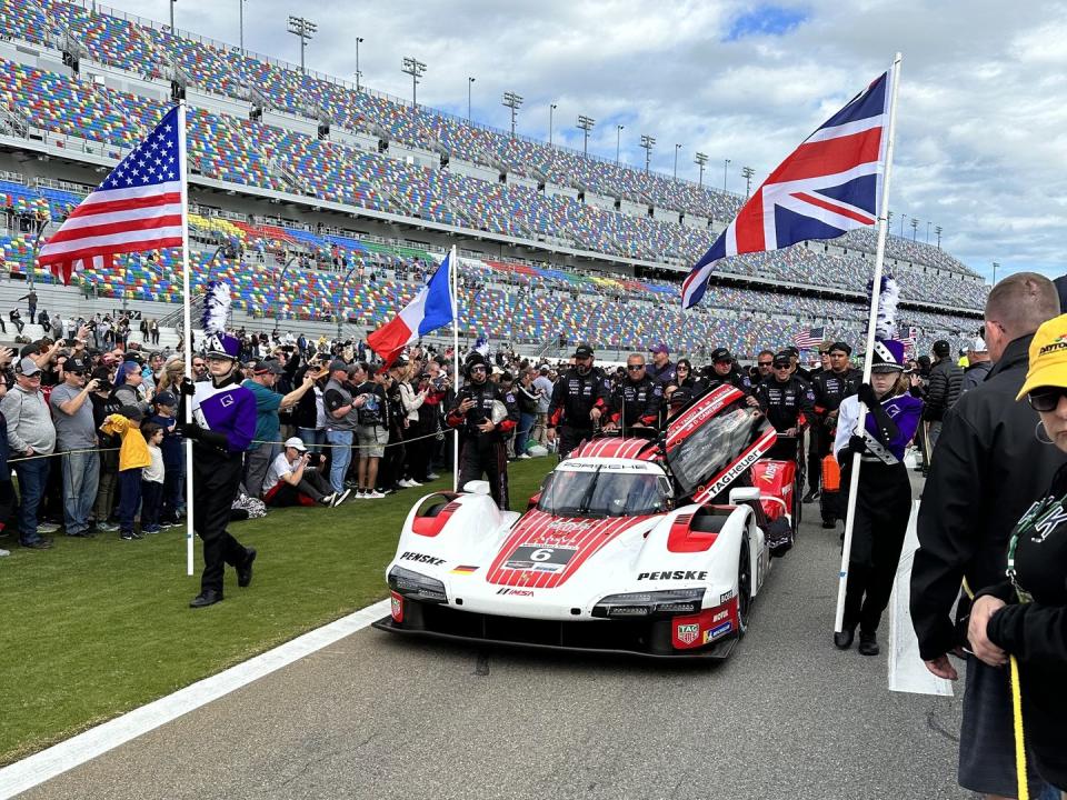 a porsche 963 on the grid before the start of the race