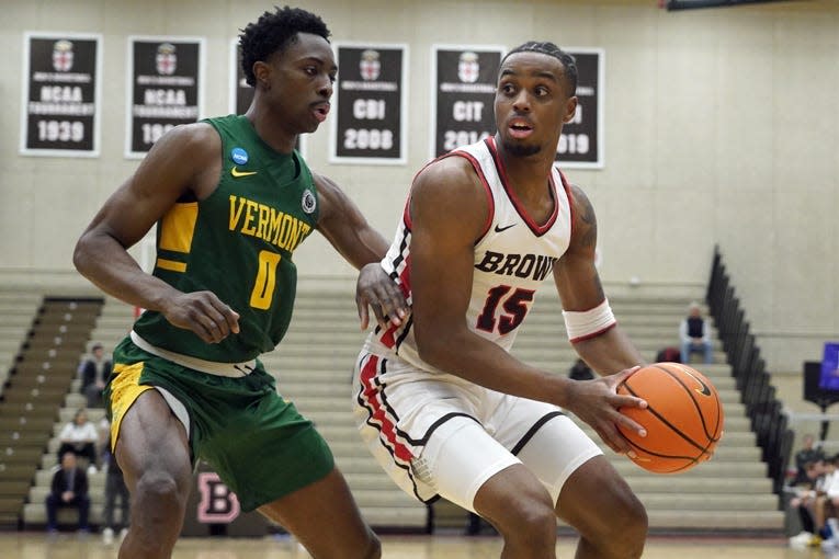 Brown's Kalu Anya, right, has entered the transfer portal but could still return to the Bears.