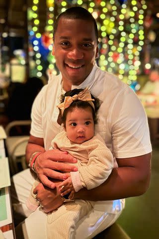 <p>Instagram/dangerrusswilson</p> Russell Wilson with daughter Amora, 3 months