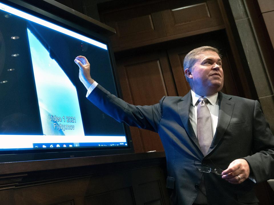 U.S. Deputy Director of Naval Intelligence Scott Bray explains a video of an unidentified aerial phenomena, as he testifies before a House Intelligence Committee subcommittee hearing at the U.S. Capitol on May 17, 2022 in Washington, DC