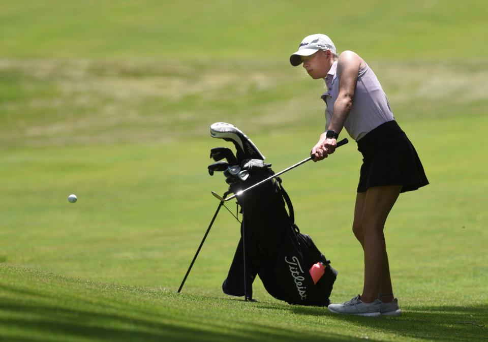 Albany junior Abby Thelen chips the ball in the Section 6-2A final round Monday, June 7, 2021, at Blackberry Ridge Golf Course in Sartell. 