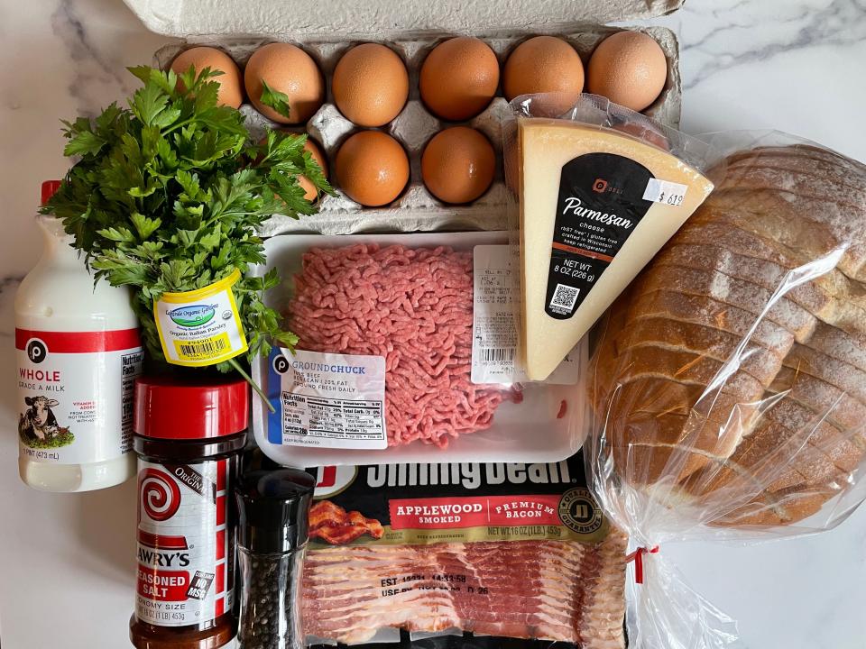 Meatloaf ingredients on a marble surface.