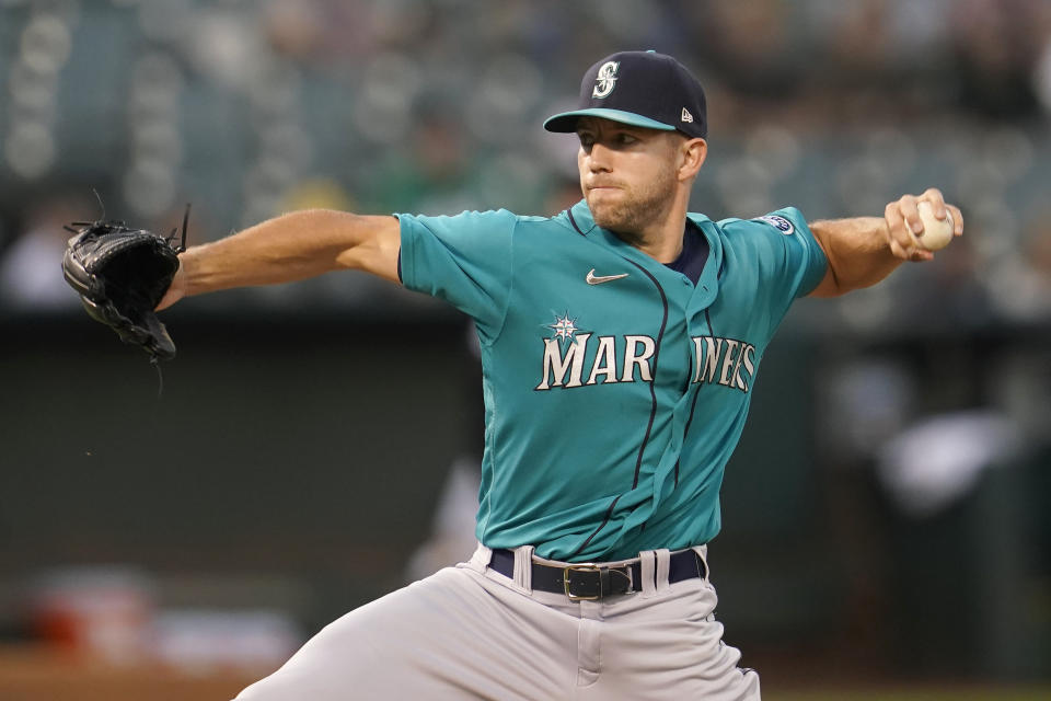 Seattle Mariners' Tyler Anderson pitches against the Oakland Athletics during the first inning of a baseball game in Oakland, Calif., Monday, Sept. 20, 2021. (AP Photo/Jeff Chiu)