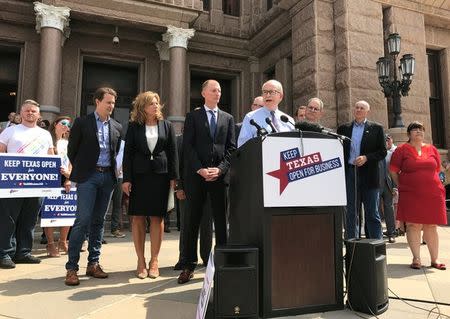 FILE PHOTO - Jeff Moseley, chief executive of the Texas Association of Business, speaks at a rally of business leaders rally in front of the Texas Capitol in Austin, Texas, U.S. on July 17, 2017. REUTERS/Jon Herskovitz/File Photo