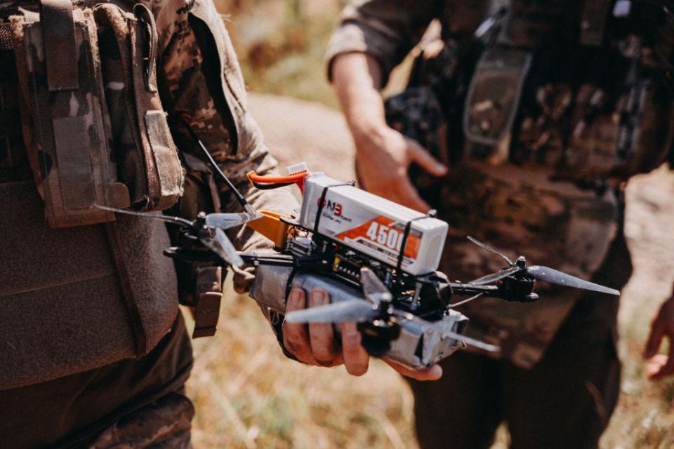 A Ukrainian drone operator from the 24th Separate Mechanized Brigade holds a drone during the testing of new military equipment including FPV drones on the training area amid Russia-Ukraine war in Donetsk Oblast, Ukraine on August 03, 2023.